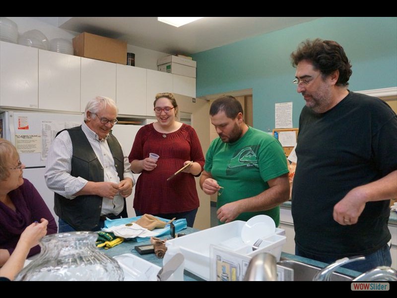 Heather, Ed, Leah, Jeremy, David Looking at Family Heirlooms