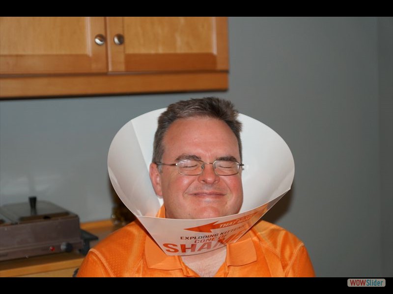 John with the Imploding Kittens Cone of Shame