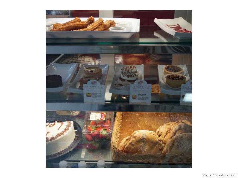 Churros, Milk Cake, Empanadas in Display Case