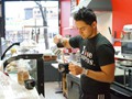 Host Pouring Mexican Coffee