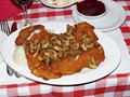 Pork Schnitzel with Mushrooms at Country Style Hungarian Restaurant