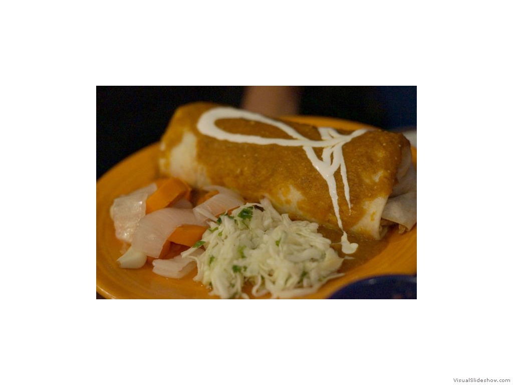 Chicken Enchilada with Tomatillo Sauce at Viva Taqueira