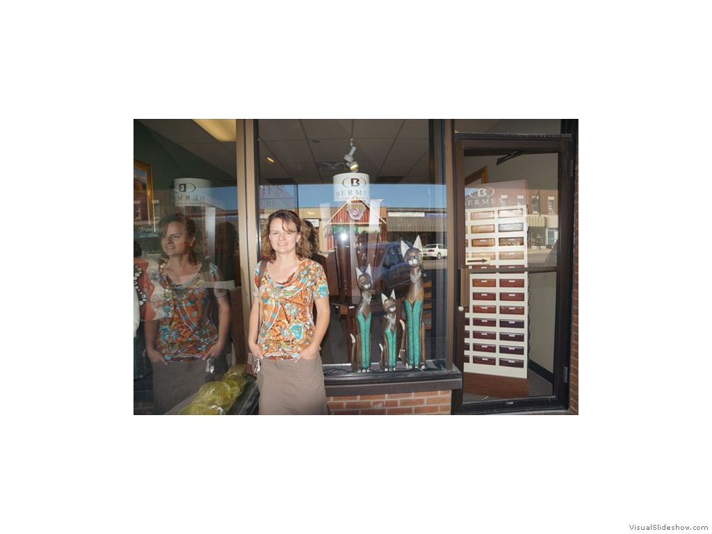 Rhonda with Wooden Cats in Tillsonburg Storefront