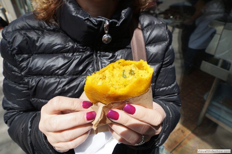 Rhonda Eating the Sabor Latino Columbian Empanada 3